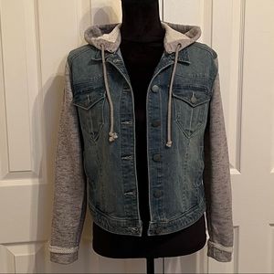 Tinseltown denim jacket with grey sweatshirt sleeves and removable hood.